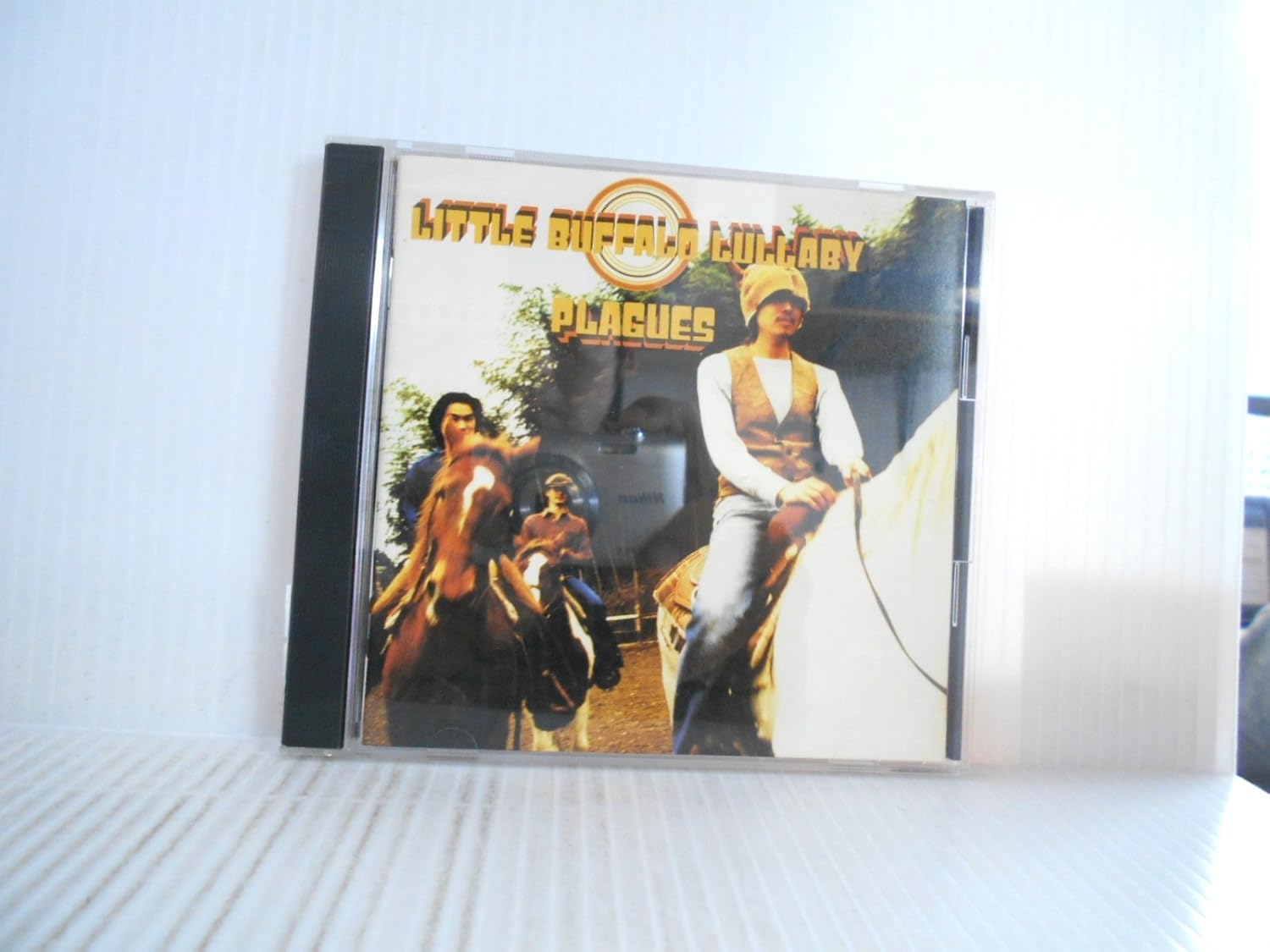 

CD PLAGUES - Little Buffalo Lullaby AMCW4216PROMO Garland 1995 Japan Rock Used