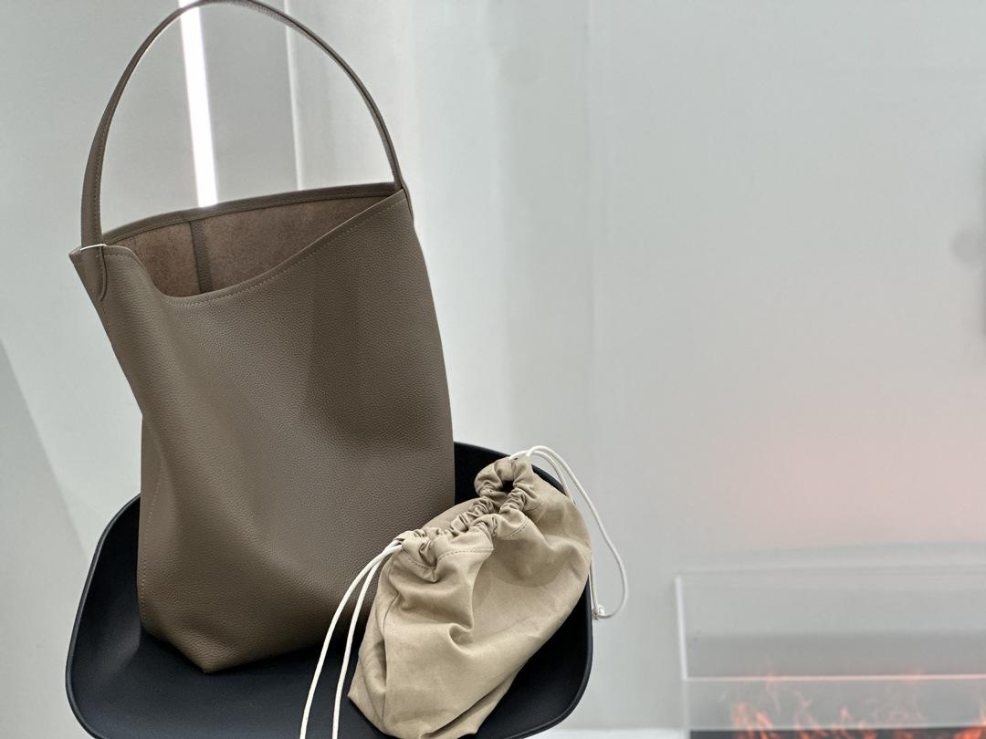 

Сумка-тоут из натуральной кожи, текстурированная сумка из коровьей кожи под мышкой, нишевая сумка-ведро на одном плече для通勤, большая вместимость Small 31 * 32 * 12cm