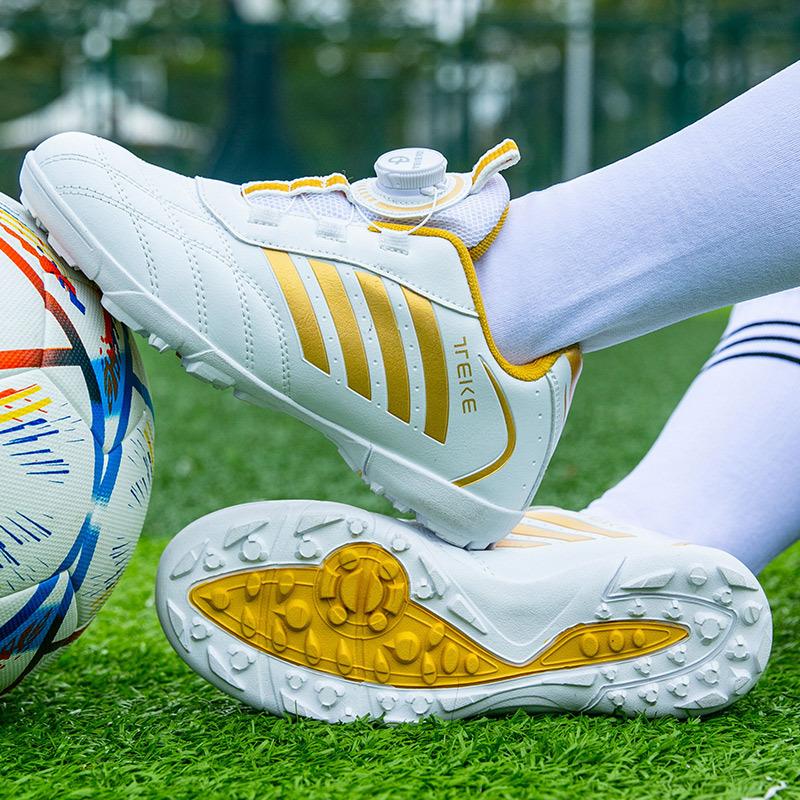 Children's football shoes broken nails rotating buckle leather feet boys and girls students artificial turf anti-skid training shoes