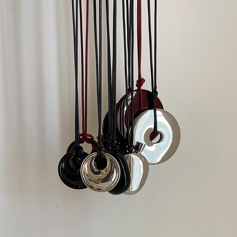 Niche Safety Buckle Water Bottle Black Leather Rope Long Necklace Female Simple Personality Fashion Versatile Neck Chain Sweater Chain