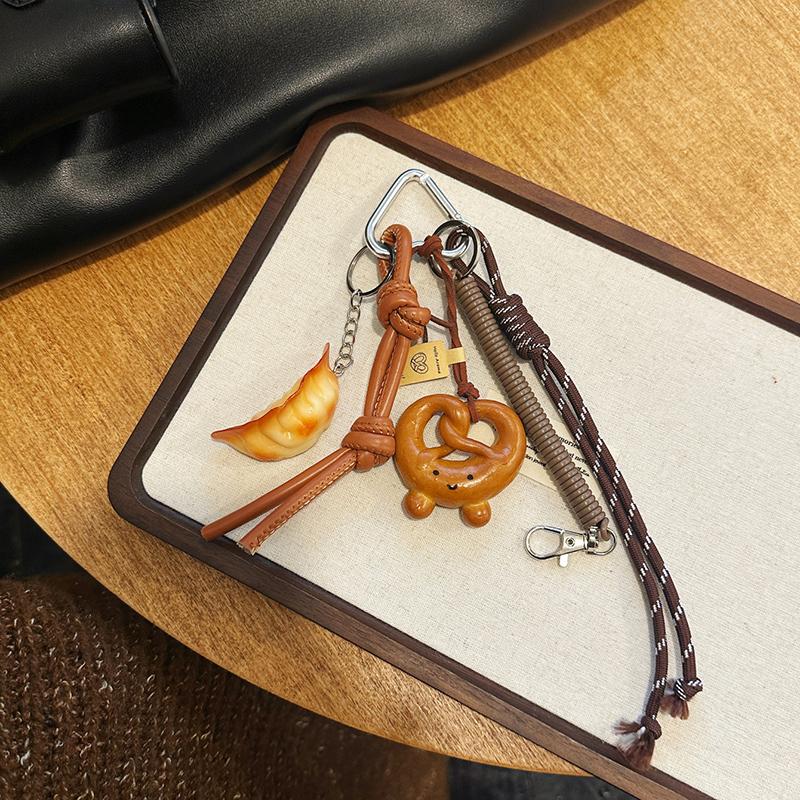 Yogodlns Cute Smiling Face Bread Woven Rope Dumpling Pendant Bag Accessory Handmade Trendy Bag Hanging Alkali Water Bread Bagel Bag Pendant