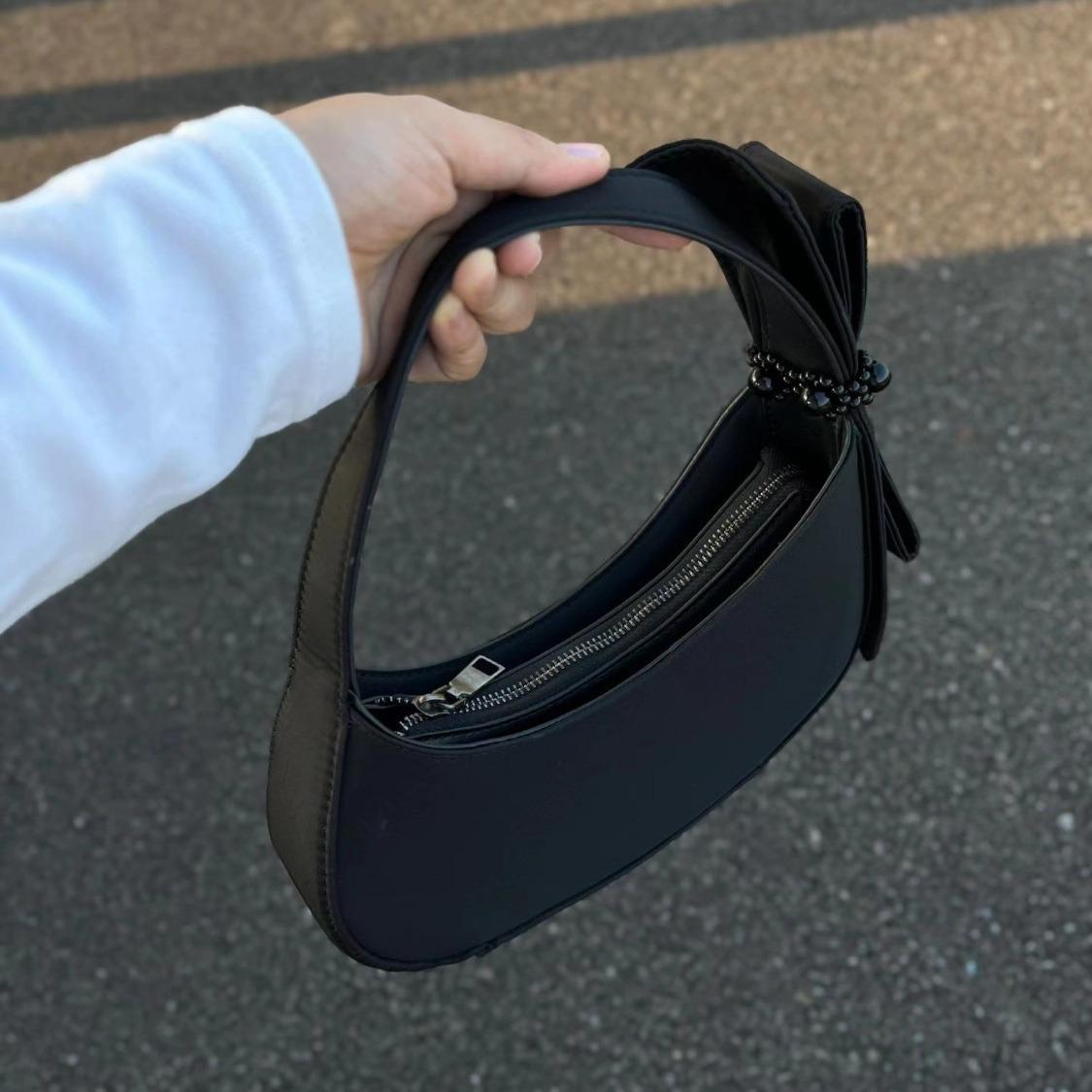 Black Bag Women s 2026 New 2026 Niche Design Bow Crescent Bag Premium Texture Versatile Handbag