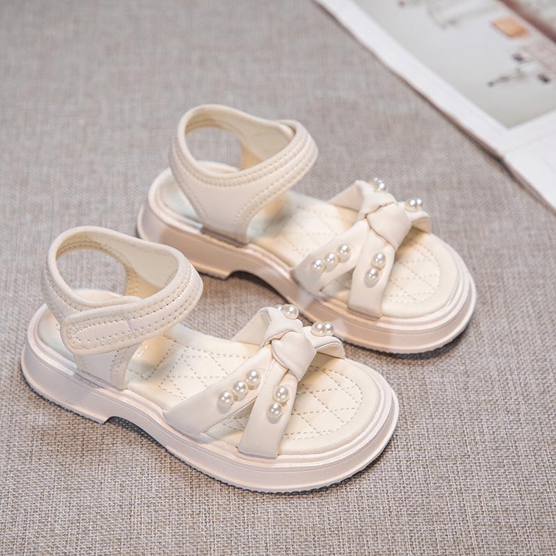 Sandalias cruzadas para niñas pequeñas, sandalias de princesa con perlas, antideslizantes, de moda, para playa, de verano, todas a juego, talla 26-37