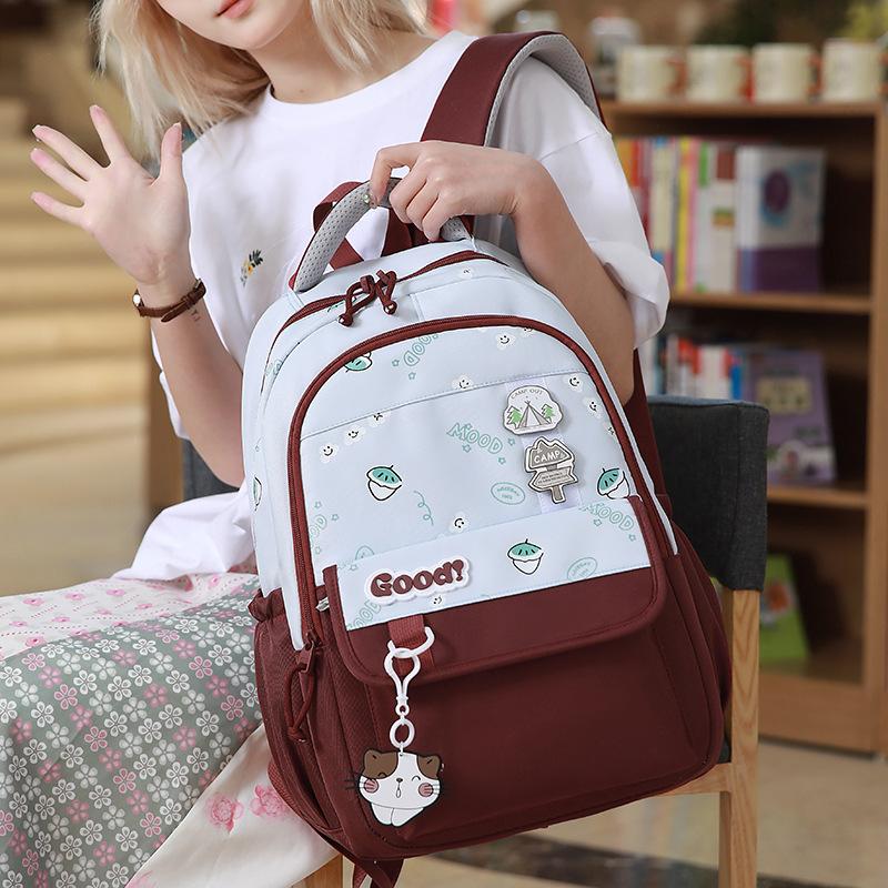 School bag for girls, new models for primary school students to reduce the burden, junior high school school bag, large-capacity backpack