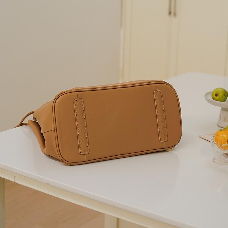 Moale Cowhdie Minimalism Geantă de mână pentru femei Geantă cu găleată Elegantă în stil franțuzesc Geantă mare de tote pentru damă Geantă de lux din piele naturală de marca de designer