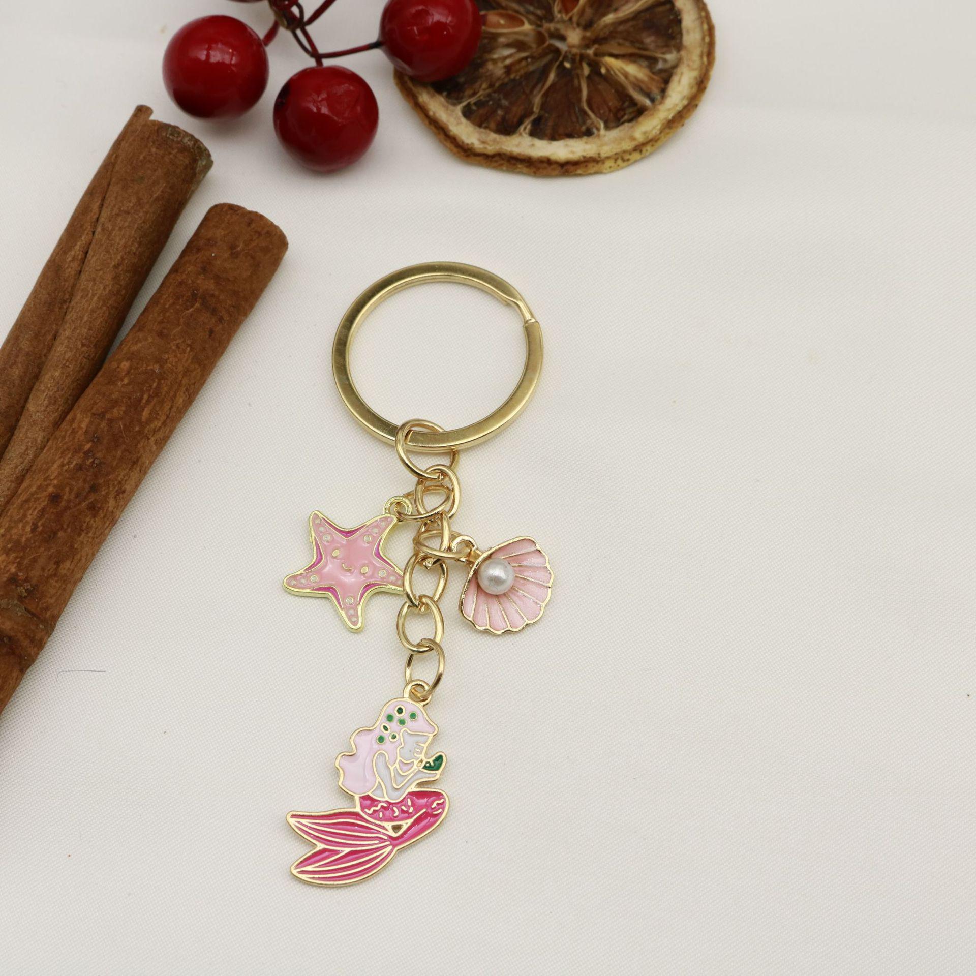 Starfish Shell Drip Oil Keychain with Pearl Pendant