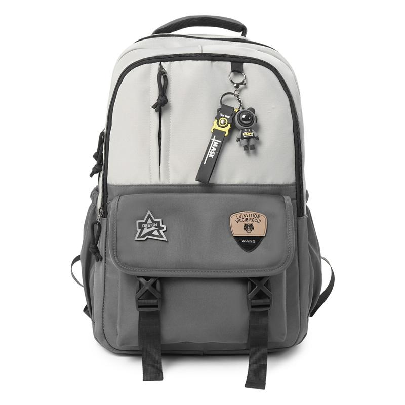 

Stylish Nylon Backpack for Men & Women – Urban Design with Patches and Adjustable Straps, Perfect for Daily Use and Travel темно-сірий колір/світло-сірого кольору