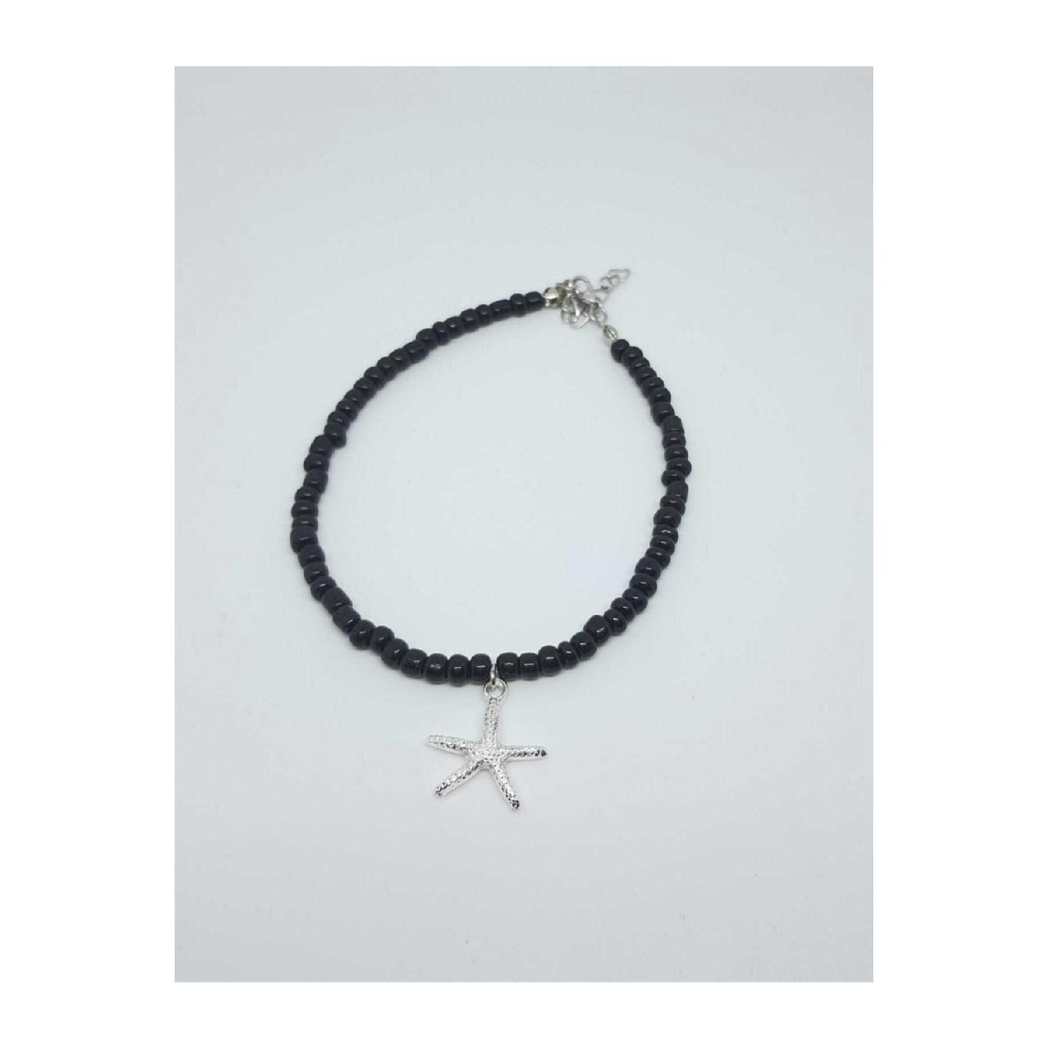 

Серебряный ножной браслет с морской звездой из черной бусины жёлтый