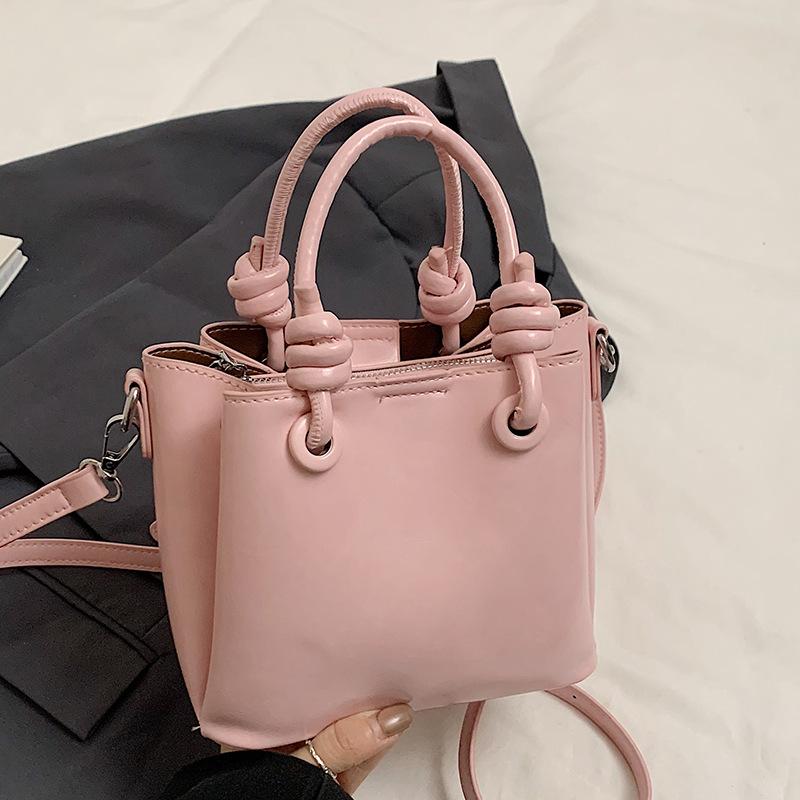Trendy new products niche simplicity high sense Korean version sweet portable bucket bag versatile commuter foreign style messenger women's bag