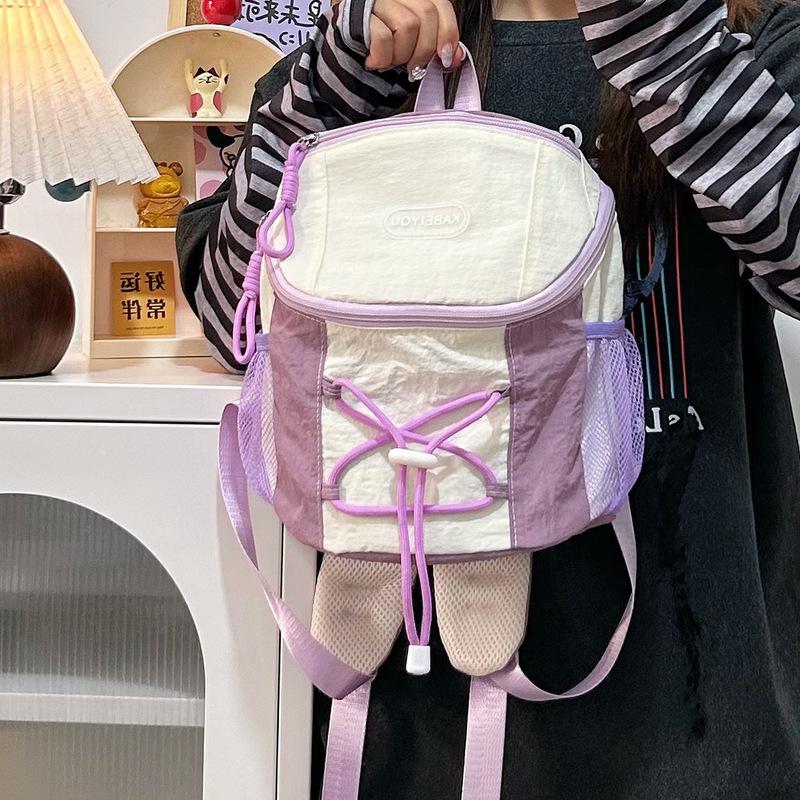 Mini backpack women's Korean niche design drawstring contrast school bag light travel outdoor mountaineering small backpack trend