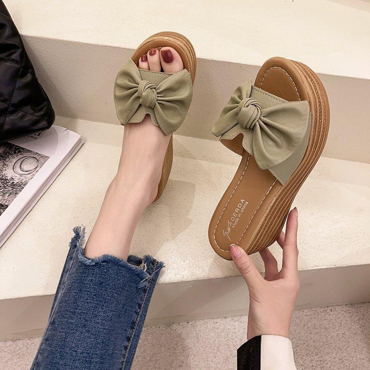 

2024 летние новые классные тапочки женские с бантом на танкетке односложные тапочки с рыбьим ртом классные тапочки женские босоножки на высоком каблуке женские 40