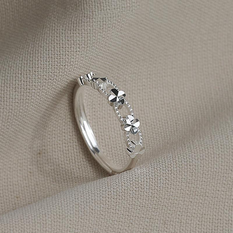 Fashionable Versatile Four-Leaf Clover Hollow Ring for Women - High-End Light Luxury Hand Jewelry 2025 Niche Design