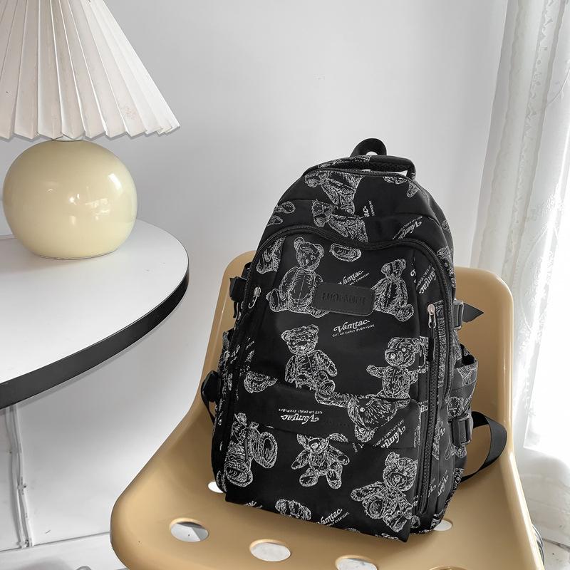 

School bag female junior high school students simple large-capacity backpack new Korean version cute graffiti primary school backpack