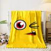Yellow background with a winking cartoon face, red eye, and open mouth. for all seasons blanket lunch break throw gift