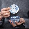 Japanischer Stil Blau und Weiß Douli Tasse Fabrik Direktverkauf Dehua Weißes Porzellan Kleine Verkostungstasse Hochbeinige Teeschale Retro S