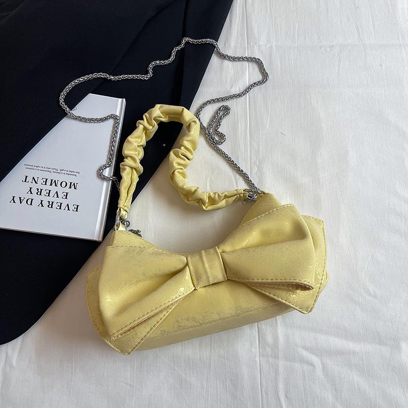 

Girls casual bow small fresh underarm women s bag 2024 new crescent bag single shoulder portable messenger bag жовтий