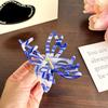 Unique Striped Acetate Butterfly Hair Claw For A Contemporary Touch To Any Hairstyle