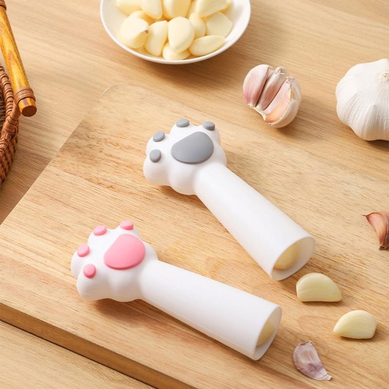 Outil Rapide Éplucheur d'Ail Avec Forme Griffe de Chat Rouleau à Éplucher Polyvalent Pour Noix Cacahuète Gadget de Cuisine