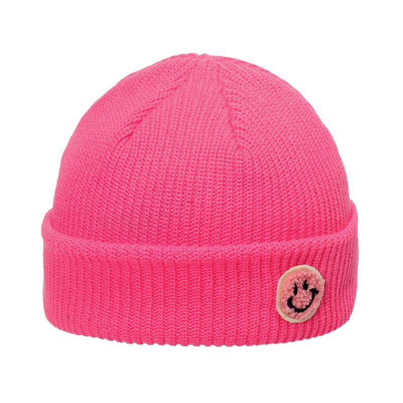 Autumn and winter wool hat male trend Japanese and Korean yuppie knitted warm smiley face sticker landlord hat candy color melon fur hat female