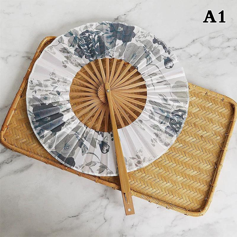 Runder Bambus-Handfächer Chinesischer Stil Blumenmuster Tragbarer Faltfächer Mit Quaste Hochzeitstanz Handgehaltene Fächer Party-Dekoration Geschenk