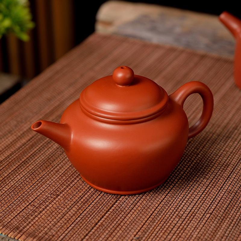 Small handmade hand-pulled vermilion mud teapot purple sand kung fu tea set Xishi pot Xishi De Zhongming furnace pot Shengji