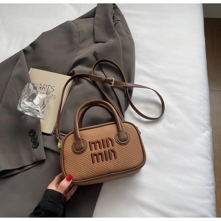 

2025 лето новая корейская версия портативная сумка для боулинга женская премиальная текстура ретро сумка-подушка Boston хаки