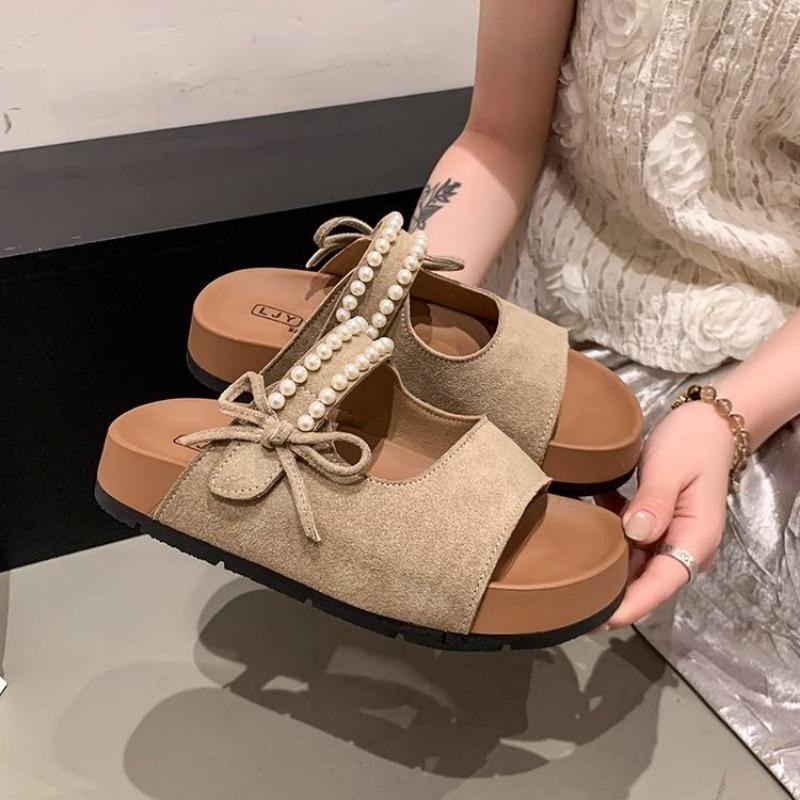Retro thick-soled one-character pearl sandals summer new bow-tied cool slippers college style hollow slippers