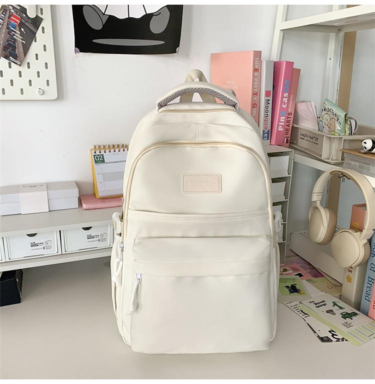 

New solid color large-capacity backpack Girls high-end school bag Children s primary school backpack білий