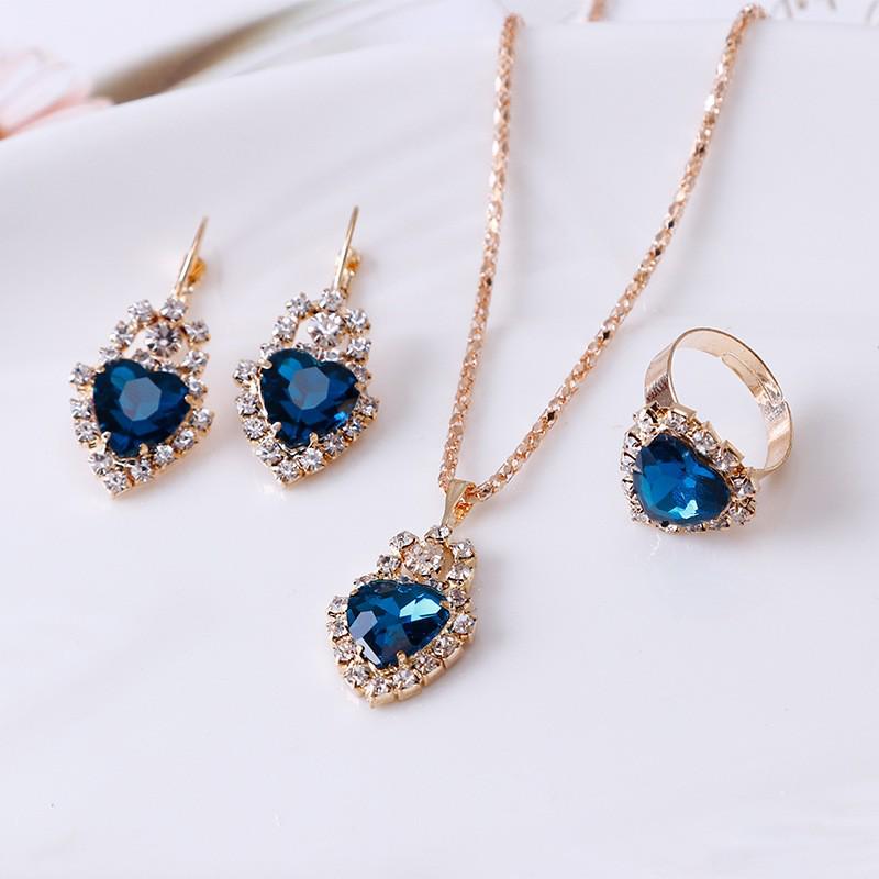 Versatile Set di Gioielli in Tre Pezzi: Collana e Orecchini Multicolor con Design a Goccia d'Acqua di Cristallo con Diamanti.