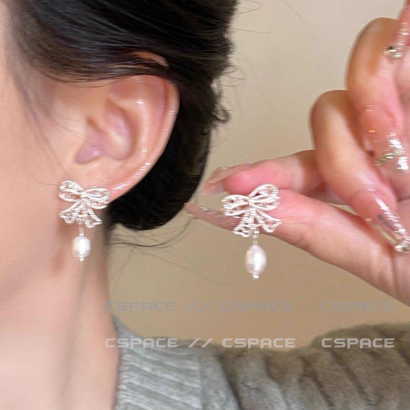 Hollow bow pendant earrings Sweet niche versatile earrings Temperament light luxury high-end earrings