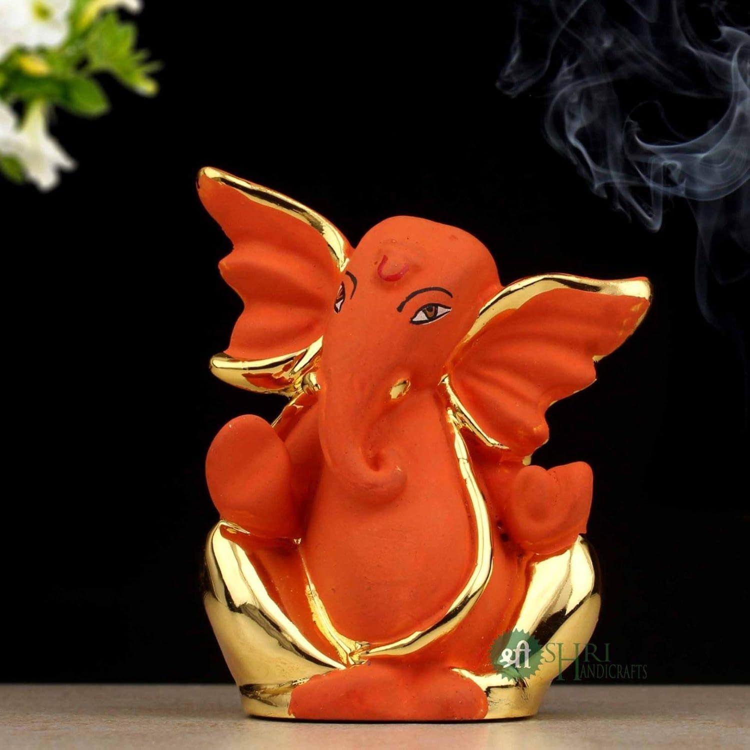

Resin God Ganpati Gold Ganesha Idol for Car Dashoboard & Home and Office Décor