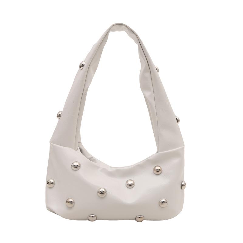 Internet celebrity armpit bag ladies 2025 new Korean version of fashion niche shoulder bag personalized rivets hand carry dumpling bag pu