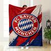 Sfondo tessuto rosso, bianco e blu con un emblema rotondo dell'FC Bayern. coperta per tutte le stagioni coperta per pausa pranzo regalo