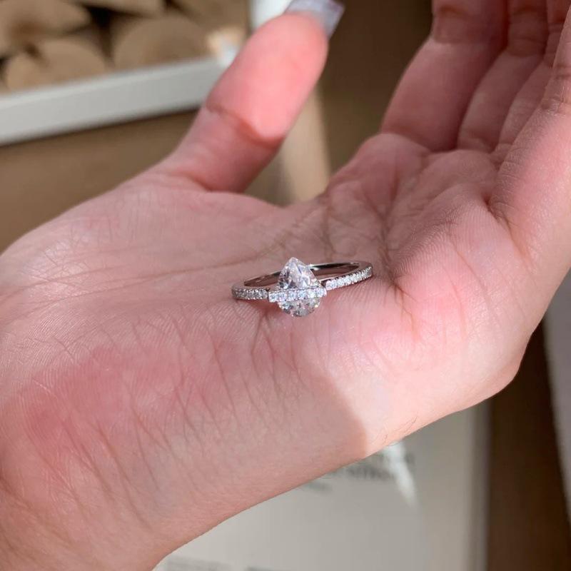 Xiaohongshu Shiny Planet Water Drop Ring for Women - Luxurious, Stylish & Elegant Finger Ring.