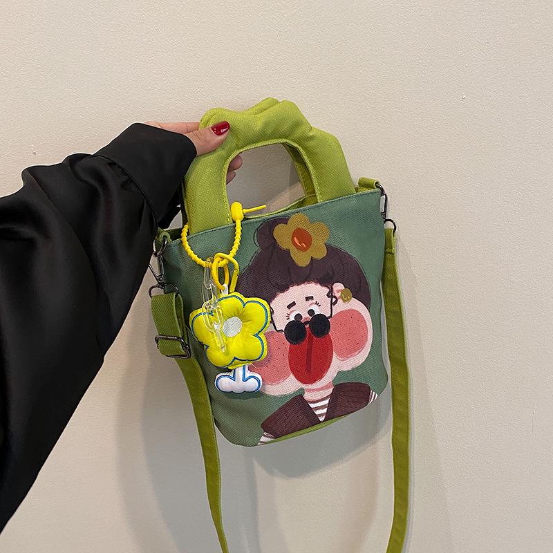 2025 Grenzüberschreitende Cartoon-Graffiti-Handtasche: Nischendesign Bucket Schulter- & Umhängetasche für Damen