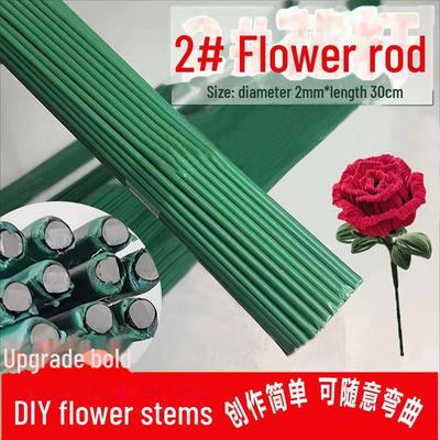 Blumenstab aus Plastiktüte mit Kunstblumen für selbstgemachte Blumenarrangements von Kindern