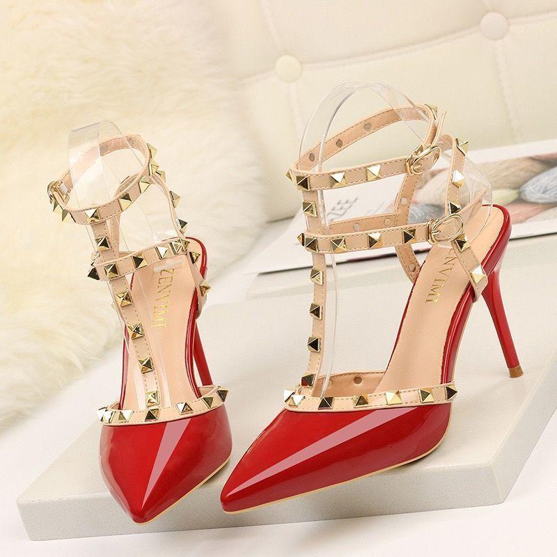 New European and American sexy thin heel rivet high heels women's one-word buckle pointed sandals women's wedding shoes medium heel single shoes