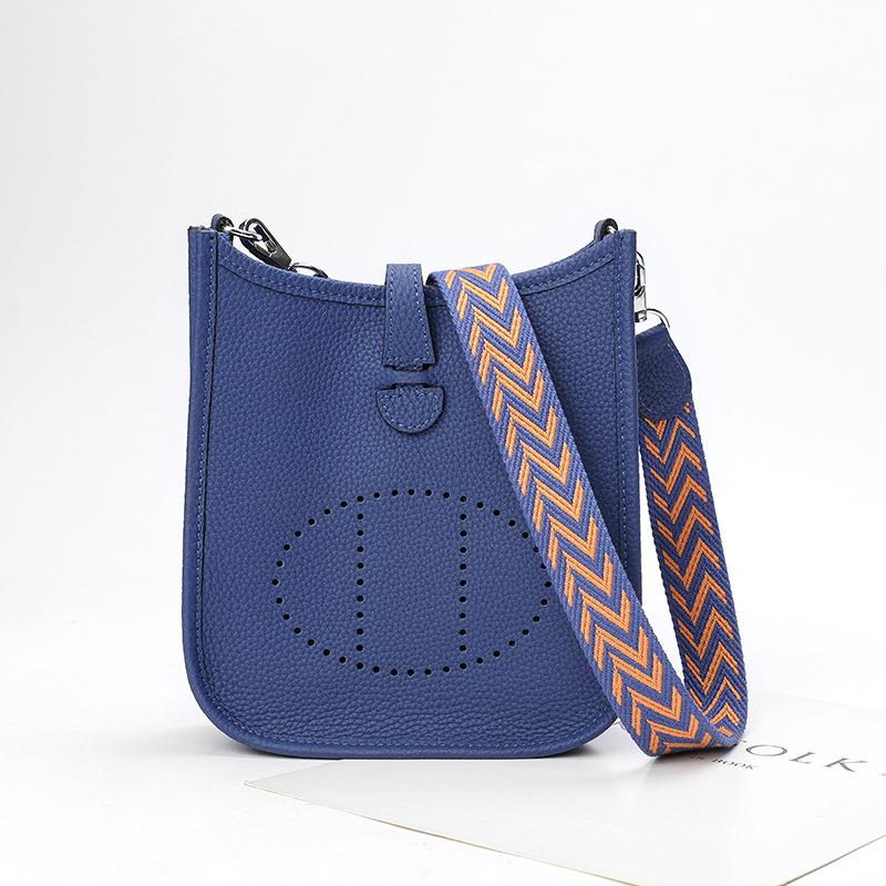 Factory wholesale first layer togo cowhide bucket bag women's bag lychee pattern hollow single shoulder crossbody bag hollow design