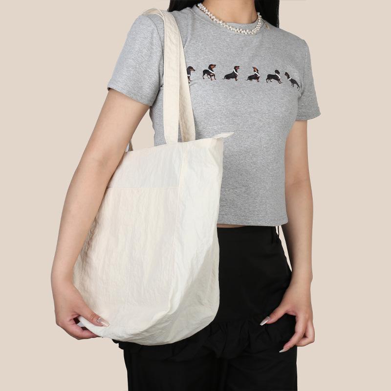 Casual simple large-capacity bag women's new niche versatile shoulder bag class commuter tote bag