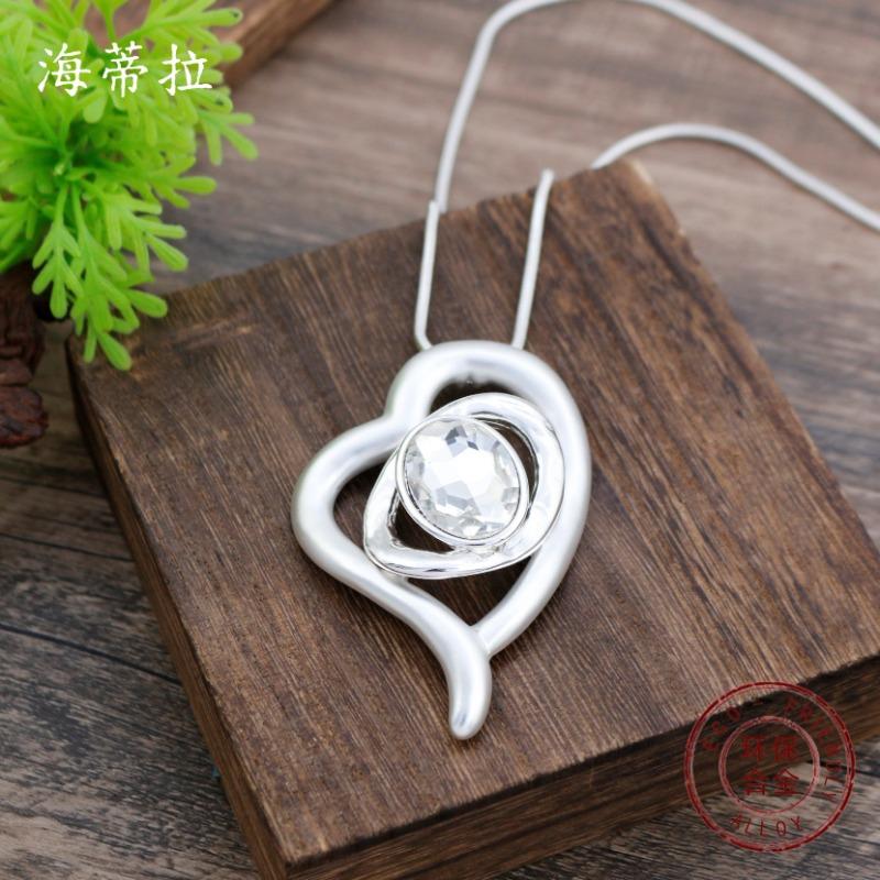 New matte hollow geometric love long pendant women's creative high sense diamond inlaid long necklace