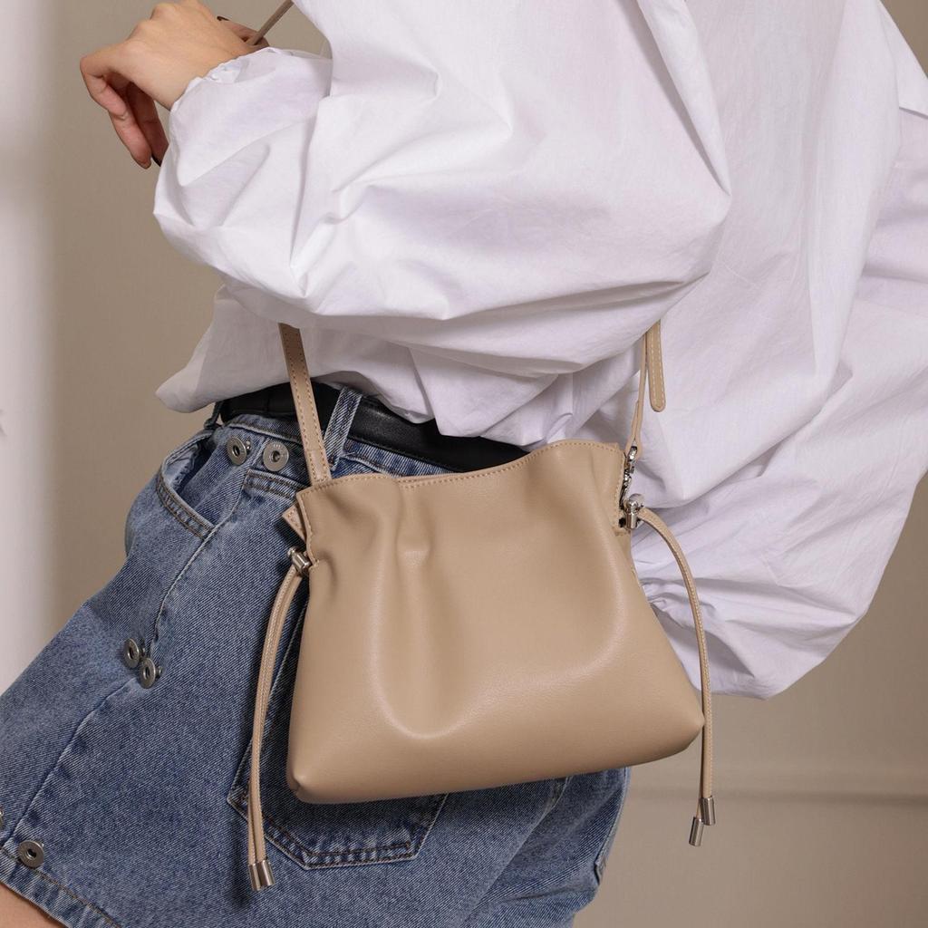 Cowhide Ruched Cloud Drawstring Bucket Bag - Soft Leather Crossbody Shoulder Bag for Women 2025.