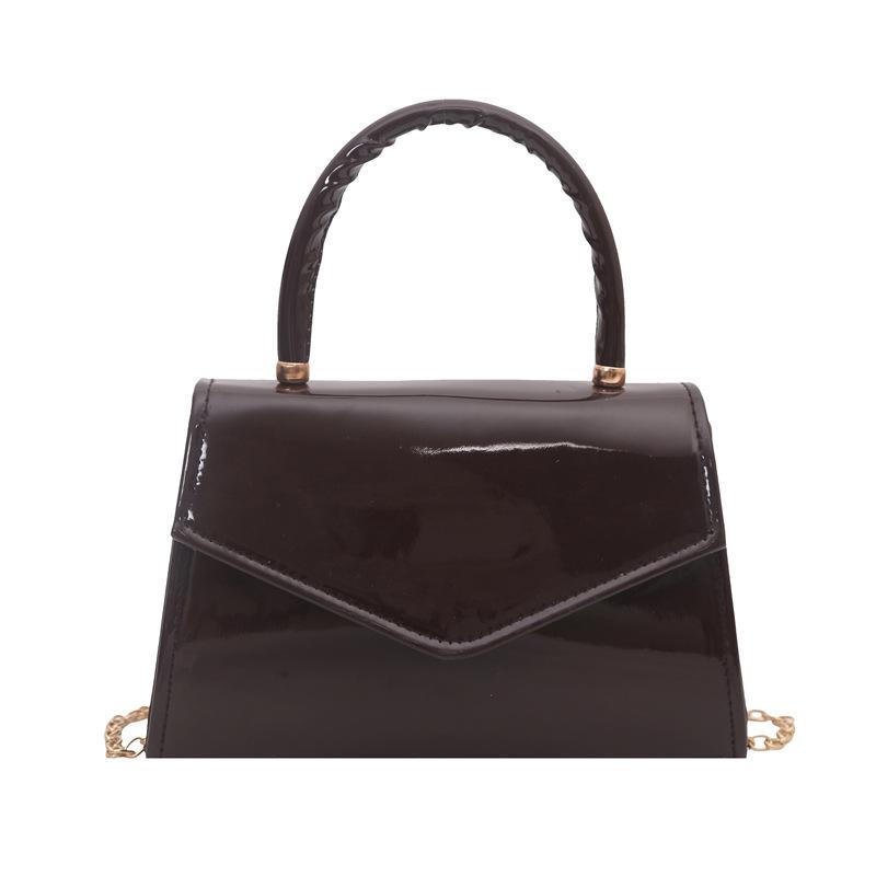 

Solid color patent leather texture highend sense niche elegant women s casual handbag commuter messenger bag