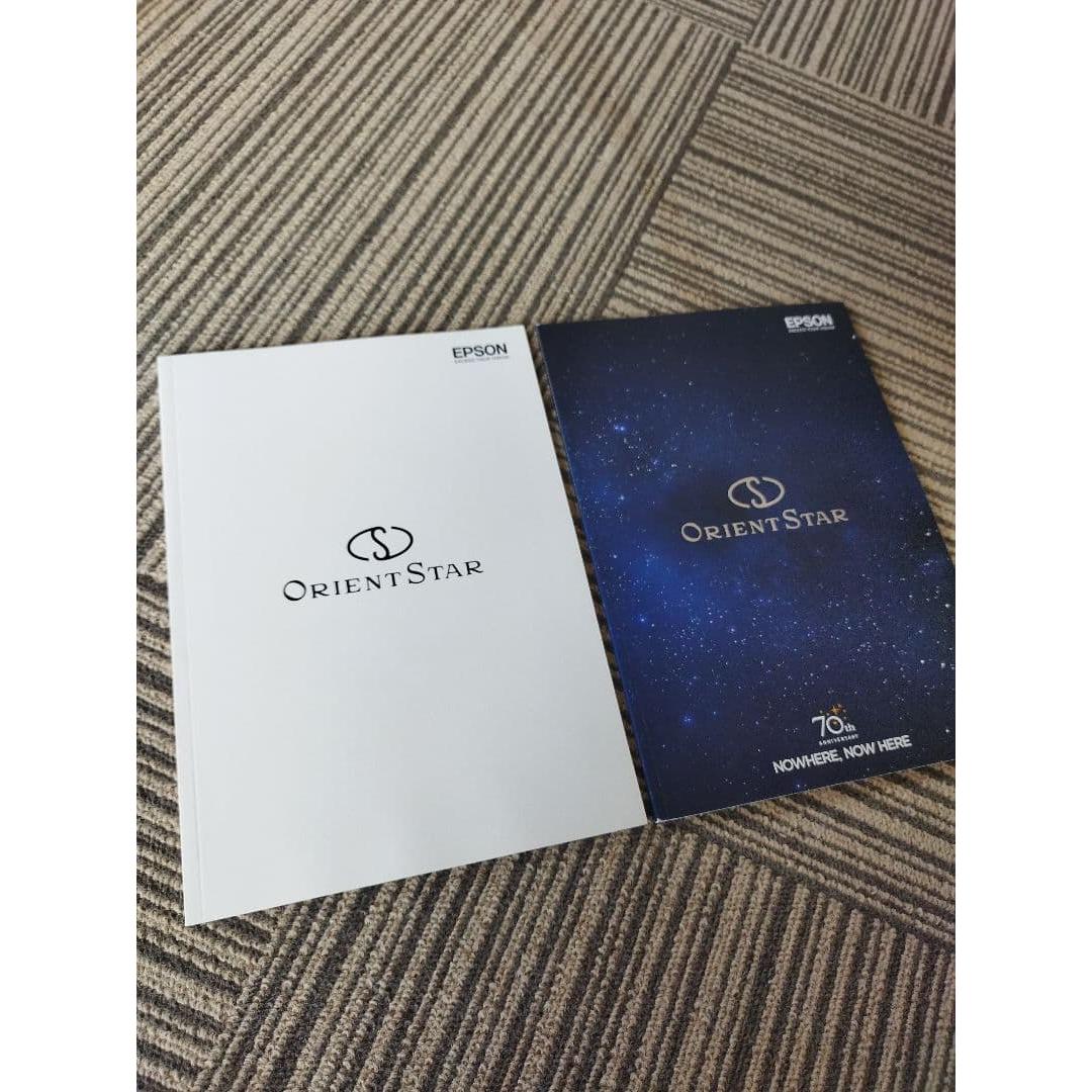 Set of 2 Orient Star watch catalogs.