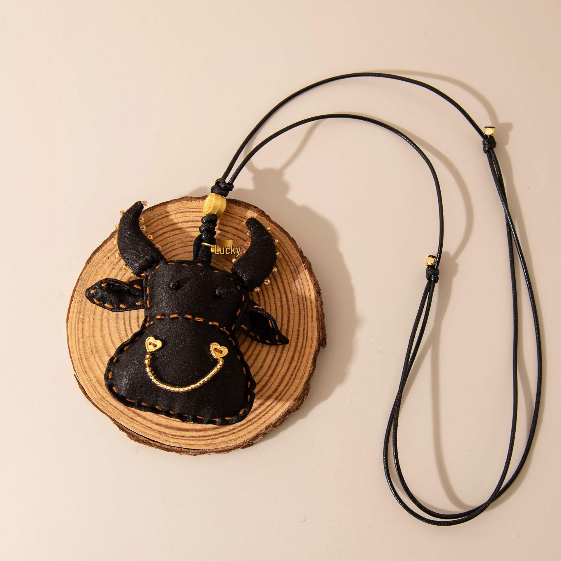 Ethnic Xiangyun Silk Necklace with Calf Pendant - Creative High-End Accessory