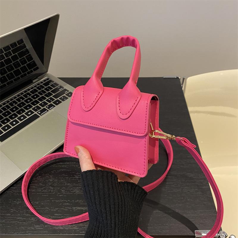 

Однотонна текстура, проста сумочка, міні-сумочка, весна 2024, нова корейська версія, модна сумка-месенджер, рот, червоний конверт троянди рожеві кольору