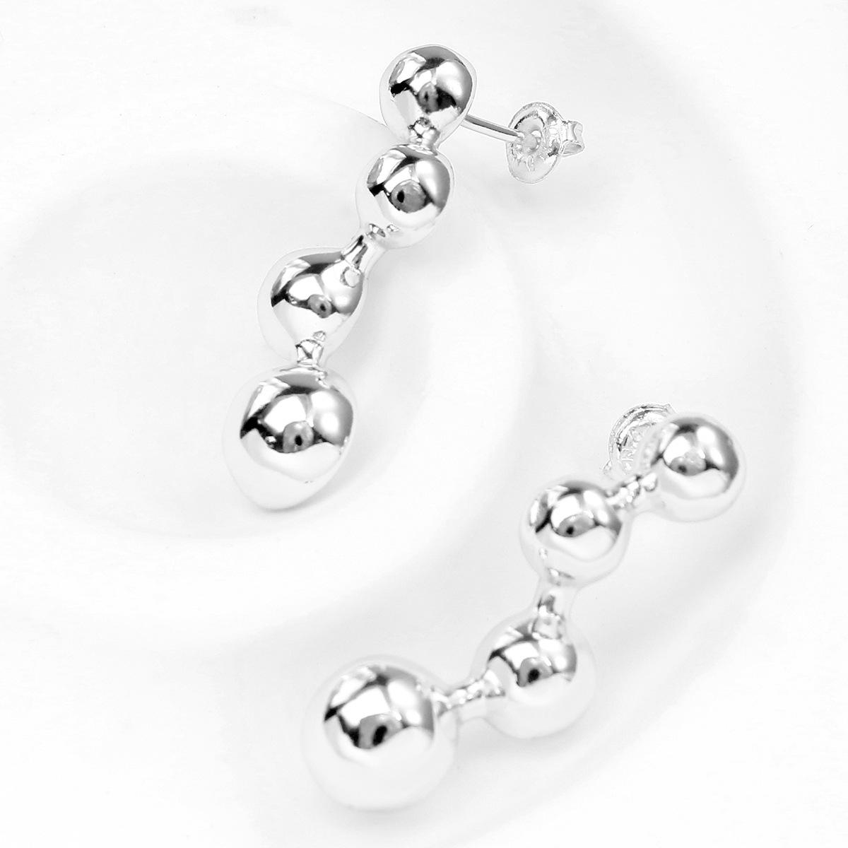 2025 UNOde50 Retro Bright 4-Link Bead Stud Round Earrings for Women