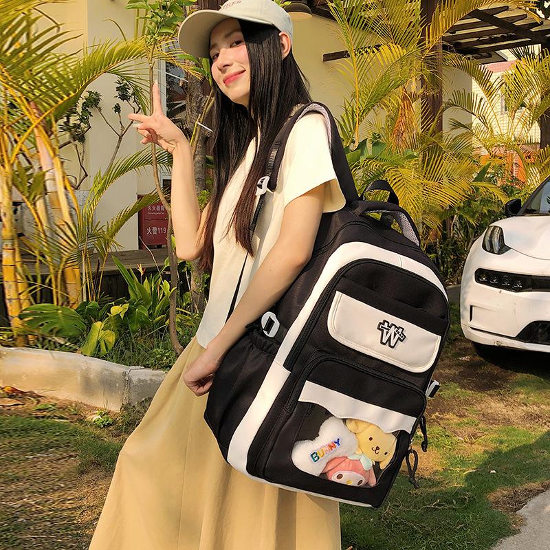 College junior high school student schoolbag, primary school student contrasting color backpack, new large-capacity high-value schoolbag