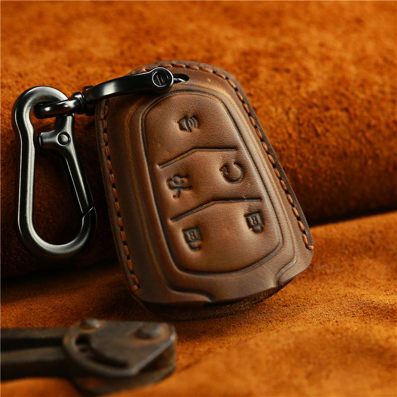 

Suitable for Cadillac key bag, genuine leather car key cover, handmade key ring, personalized cowhide keychain.