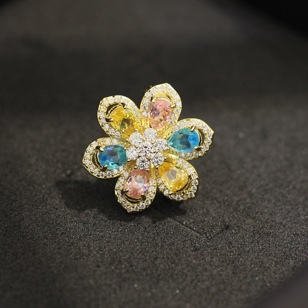 New product exquisite and versatile color zircon inlaid stone flower brooch temperament fashionable and small flower pin collar pin women's model