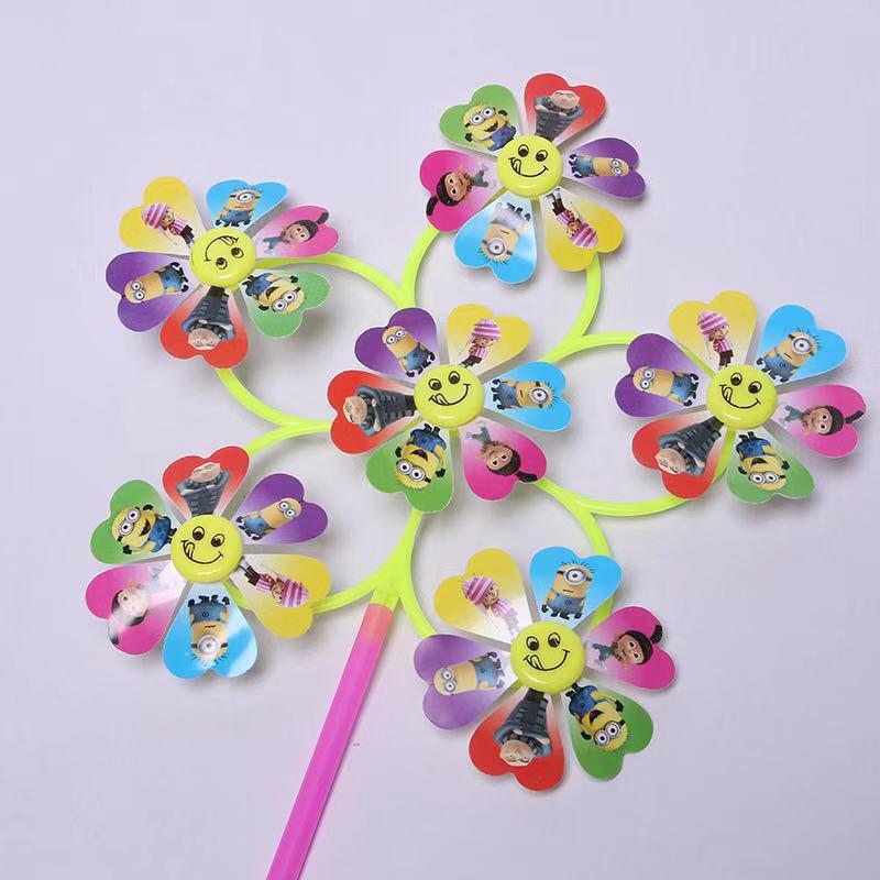 

Colorful Smiling Face Cartoon Pinwheel Toy – Six-Wheeled Educational Decorative for Kids